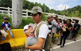 [ẢNH] Người di cư Honduras chạy trốn đói nghèo, ầm ầm đổ về biên giới Mỹ